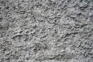Texture of dry plaster on the wall.