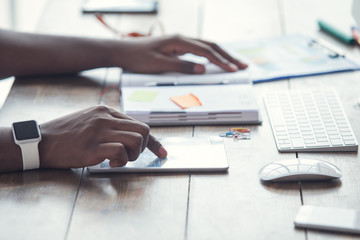 Young african man working in the office business