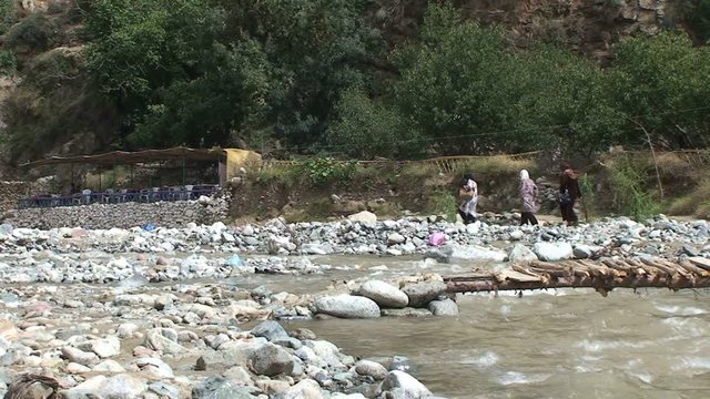 Muslim woman at Ourika river