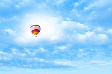 Hot air balloon flying in a sky