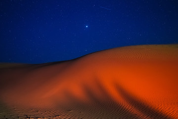 Barkhan dune, starry night in the desert of Kazakhstan - obrazy, fototapety, plakaty