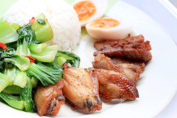 stir fried vegetables, Hard-boiled egg, Fried pork and Fried chicken wings with thai jasmine rice...