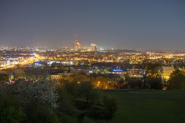 Fototapeta na wymiar Panoramic view of Crakow city with chimneys - nowa huta by night