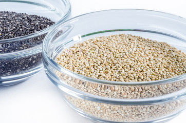 Quinoa and chia seed in a glass bowl isolated on white background. Closeup shot. Healthy food concept.