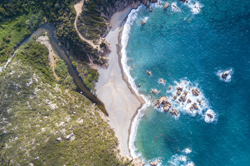 Naklejka na ściany i meble Aerial view of the amazing turquoise beach. .Emerald Coast in Sardinia Island, is one of the most beautiful and famous coasts in the world