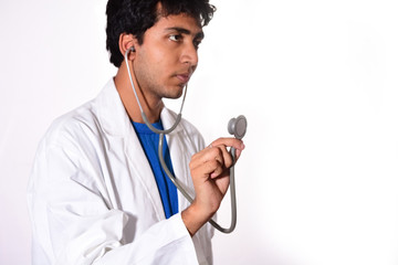 Close-up of a male doctor holding a stethoscope 