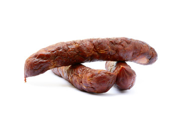 Tasty high quality smoked sausage isolated on white background