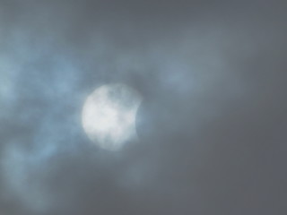 Naklejka na ściany i meble The clouds in the sky-a solar eclipse in March 2015
