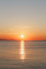 beautiful sunset sunrise at sea sun nature clouds rays
