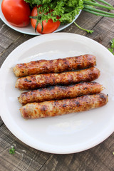 Grilled sausages on the coals