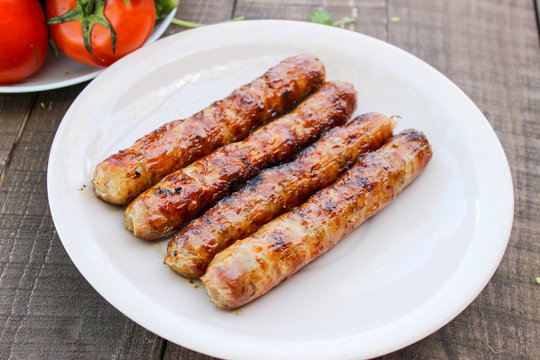 Grilled sausages on the coals