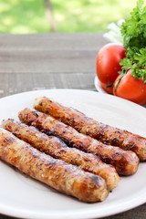 Grilled sausages on the coals