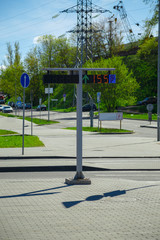 Digital parking sign on the street with the number of available places