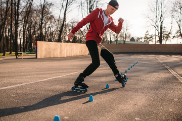 Roller skater, trick exercise in park