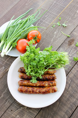 Grilled sausages on the coals