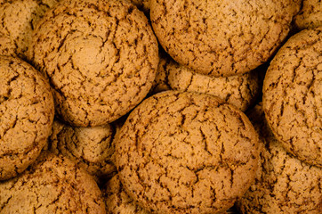 Stack of the oatmeal cookies on wooden table