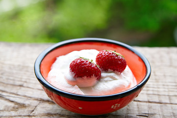Bowl of Strawberries and Cream