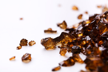 Brown Amber stones on white background