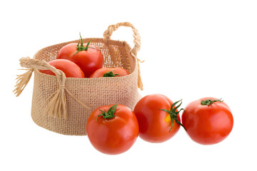 Tomato In the basket isolated on a white background