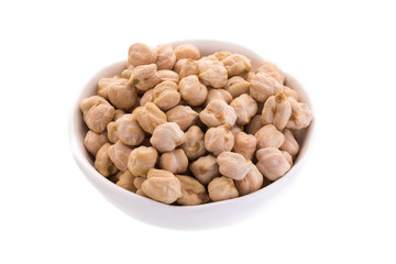 Garbenzo beans on a wooden bowl isolated on a white background