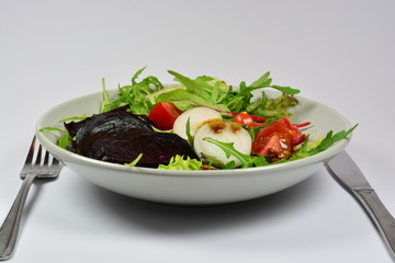 A healthy salad with onions and beetroots