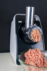Mincing machine and meat