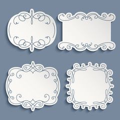Set of cutout paper frames with flourishes