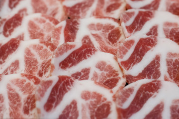 Fresh raw pork on the plate.