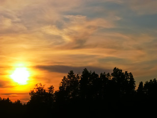 Fototapeta na wymiar Sunset over the Berezovskoye lake, Karelian Isthmus