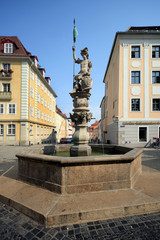 Fototapeta premium Sandsteinbrunnen in Görlitz am Obermarkt.1 