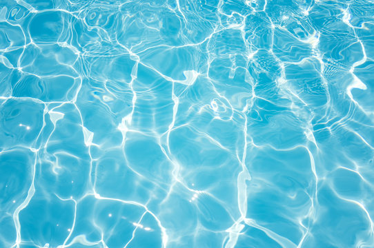 Beautiful ripple wave and blue water surface in swimming pool