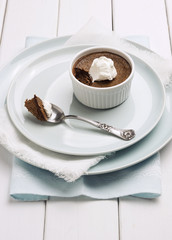 Chocolate Pot de Creme and Whipped Cream with Bite on Spoon