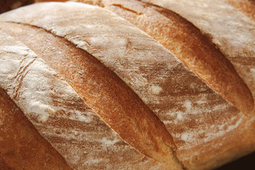 Bread texture background, closeup of baguette loaf