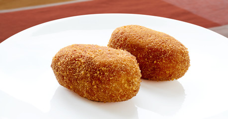 Chicken cutlets on a white plate. Ukrainian food.