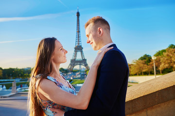 Romantic couple near the Eiffel tower in Paris