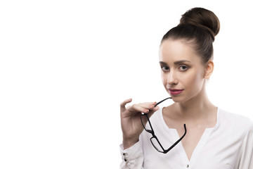 female portrait in glasses on a white background