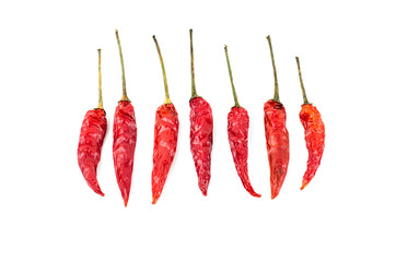 Dried red chili peppers isolated on white background.