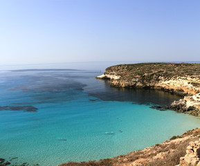Pure crystalline water surface around an island - Lampedusa, Sicily