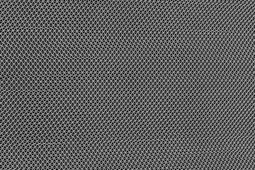 Abstract structure of a rubber mat as background. Rubber mat is designed to collect dirt and prevent it from entering the room. Structure of the grid. Polyurethane part in gray color.