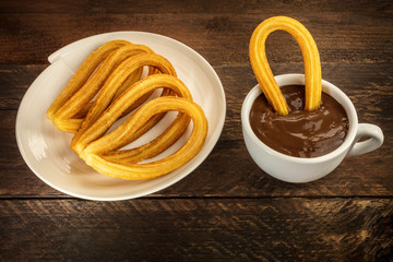 Photo of churros con chocolate, traditional Spanish dessert