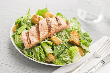 Salmon Caesar Salad with Croutons and Drink
