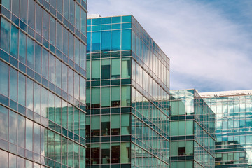 Abstract fragment of modern architecture, walls made of glass and concrete