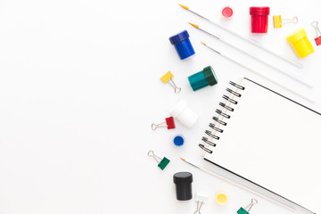 Artist's desk and workspace. Creative process, art workshop details with copyspace. Flat lay