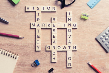 Conceptual business keywords on table with elements of game maki