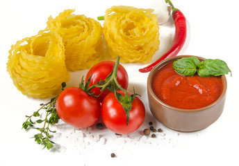 dry pasta and tomato sauce