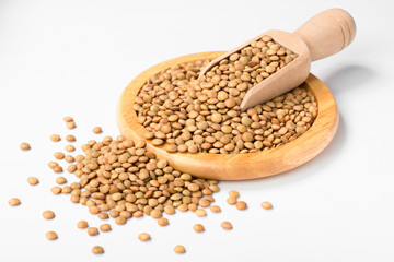 raw lentils on white, (large depth of field, taken with tilt shift lens)