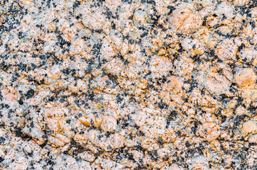 Natural granite texture, orange black speckle.