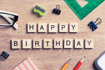Elements of education game spelling words on wooden office table
