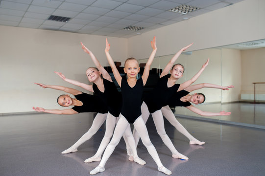 The choreographer teaches children dances.