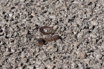 Spacer and bolt in gravel
